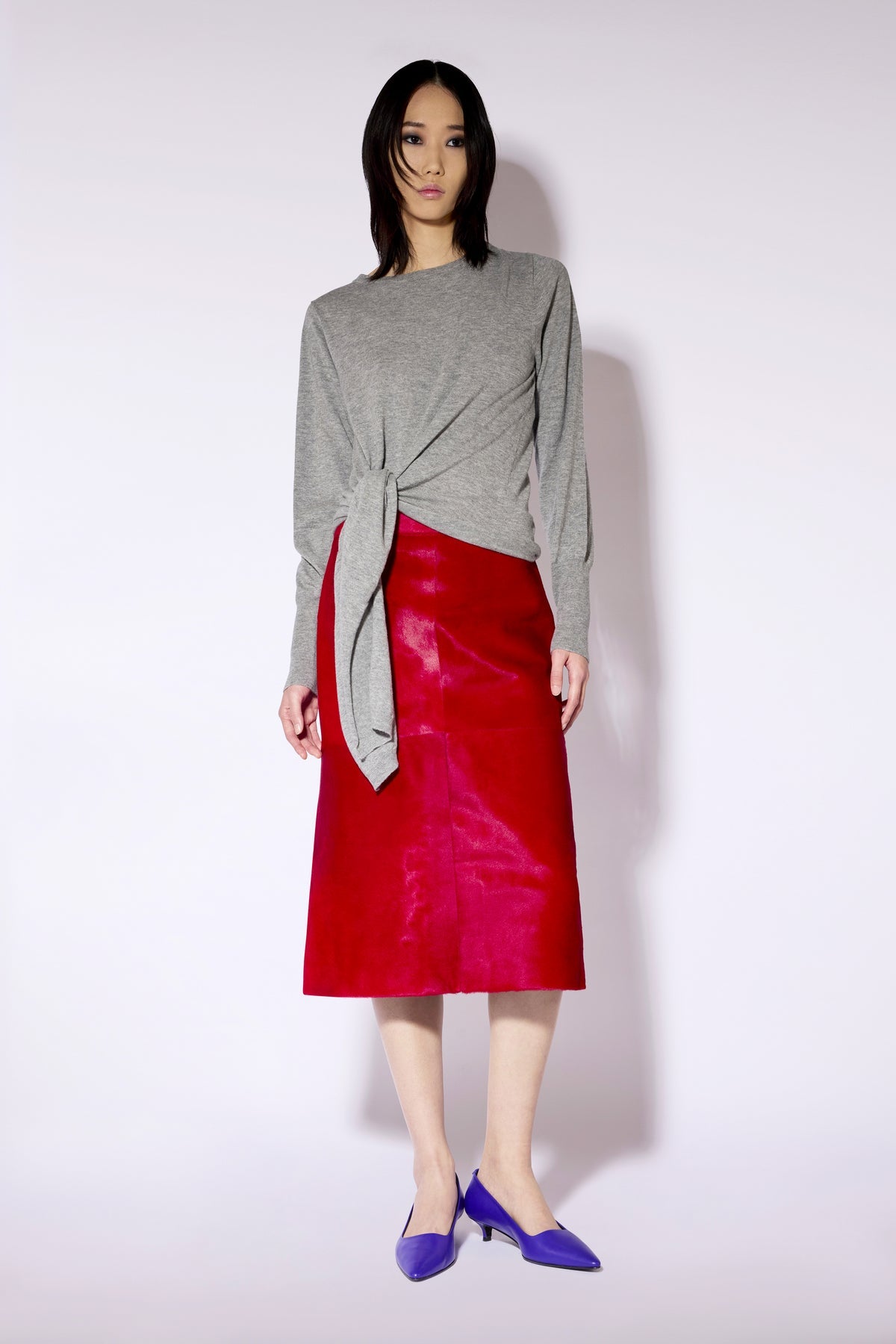 Jersey gris de lana con detalle de nudo