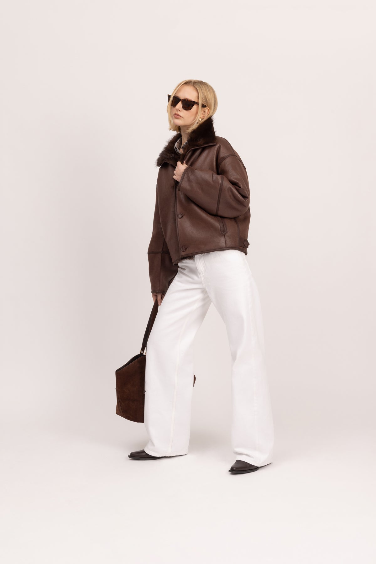 Chaqueta reversible de efecto piel y pelo en marrón